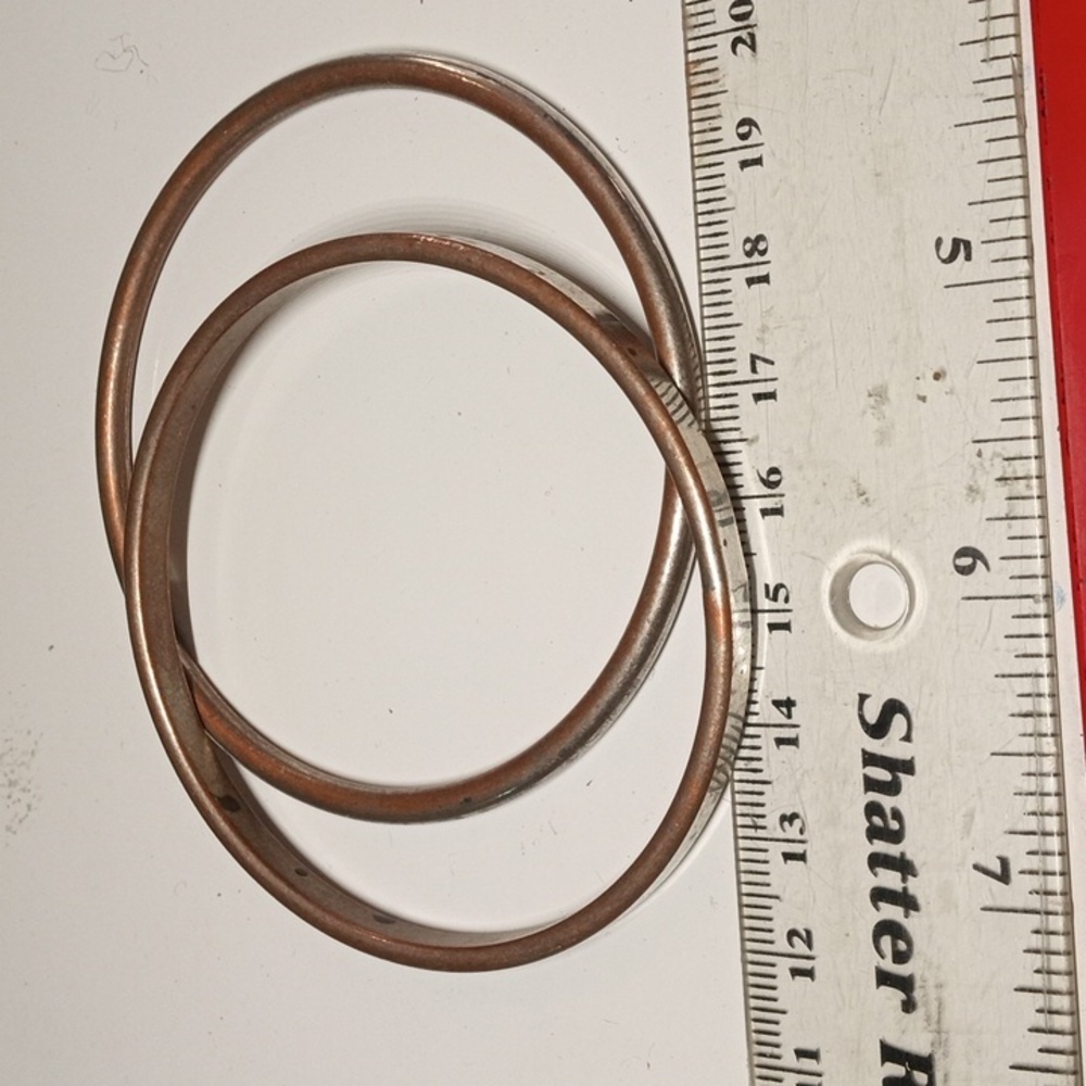 2 vintage silver plated bangles.